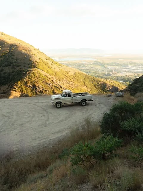 A classic truck on a Utah mountain road